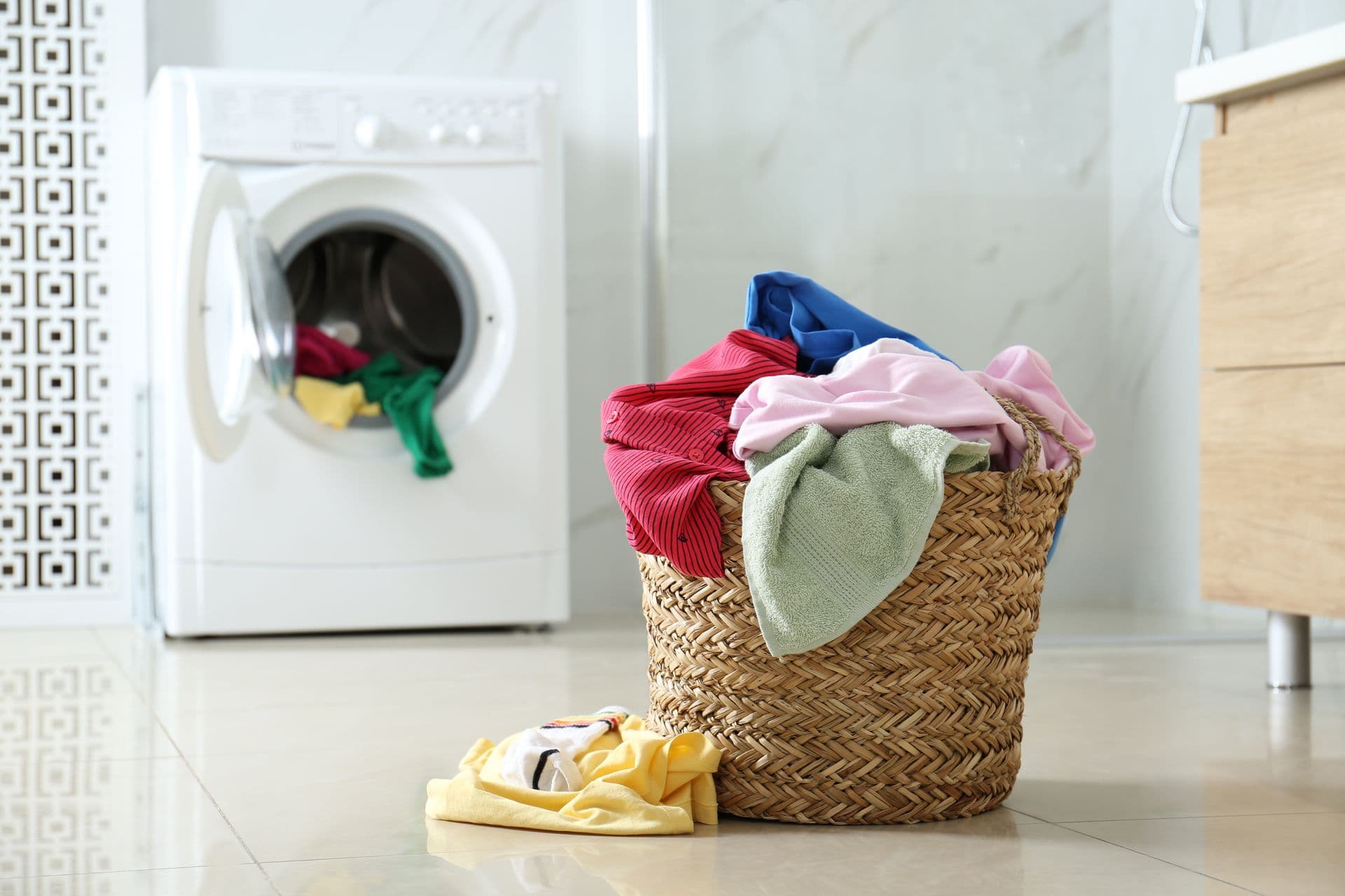 fewa-main- bigstock-Wicker-Laundry-Basket-With-Dif-398414717.jpg